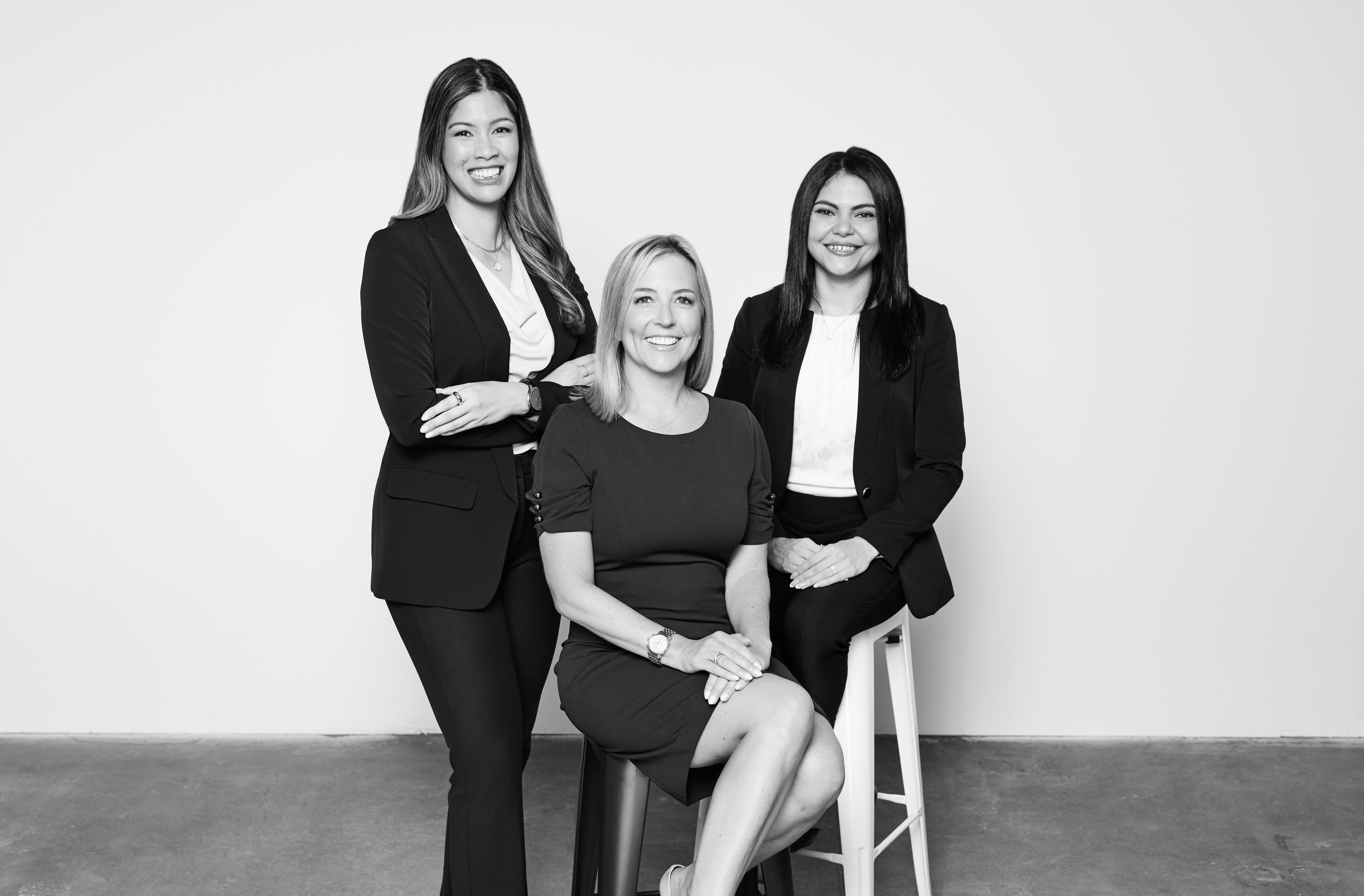 image of three women in suits